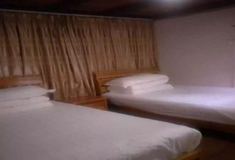 Nanjing Tulou Qingdelou Inn