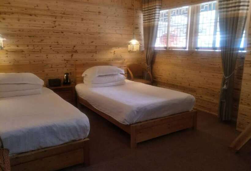 Nanjing Tulou Qingdelou Inn