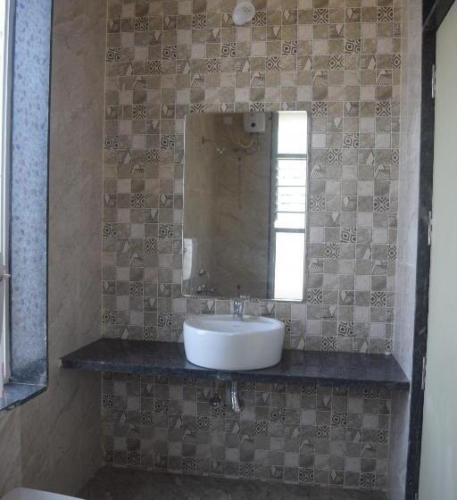 בית מלון כפרי Oasis Resort