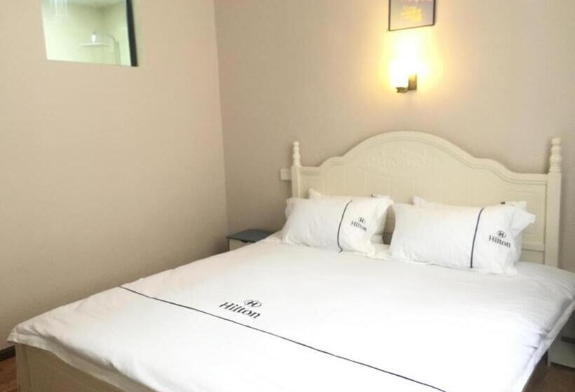 Пансион Huakun Chain Tourist Guest House