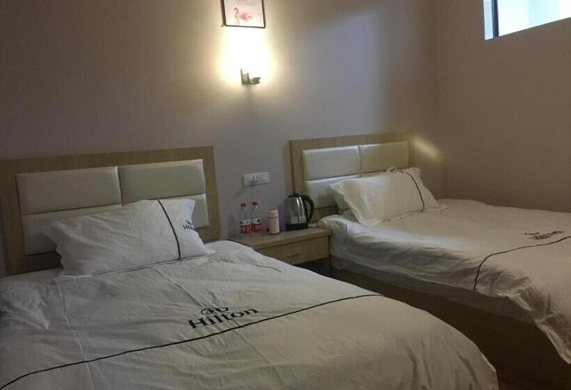 Пансион Huakun Chain Tourist Guest House