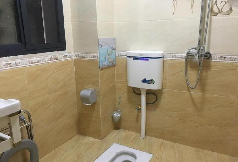 Пансион Huakun Chain Tourist Guest House