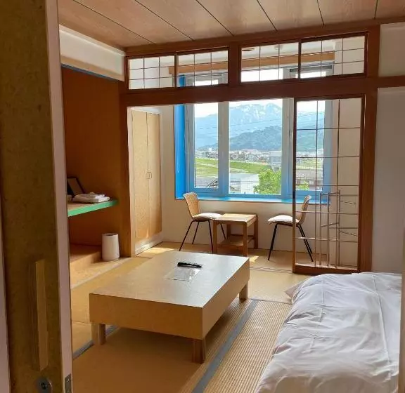 ペンション Muikamachi Hutte