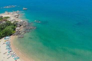 فندق Calamansi Cove Villas