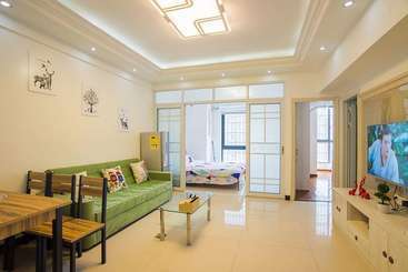 Turist apartmanları Xin Wo Apartment Railway Station