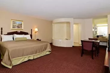 Отель Travelers Inn And Suites