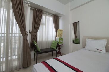 Apartamenty turystyczne Reddoorz Apartment @ Margonda Residence 3