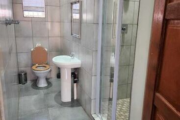 Pension Suits Guest House & Bar