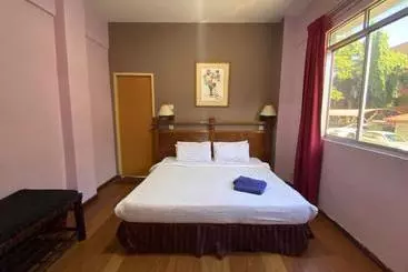 ホテル Oyo 90061 Kuhara Court Apartment Suite