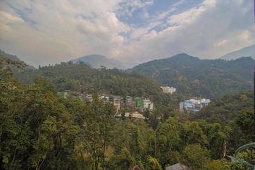 בית מלון כפרי Oyo 27898  Isita International