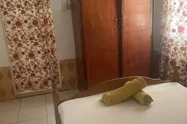 Pensión One World Village Guesthouse