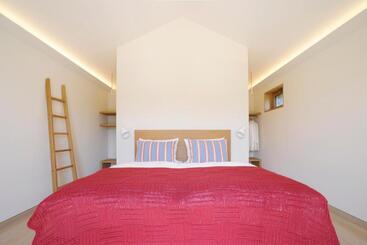 בית מלון כפרי Weinkulturgut Longenschloder