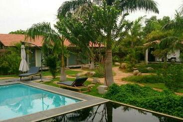 تختخواب و صبحانه Temple Tree Retreat