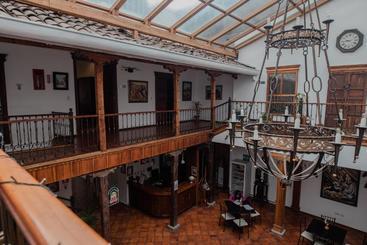 Suites & Hotel El Quijote
