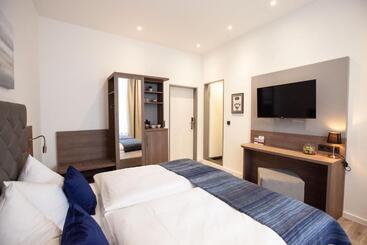 호텔 Gästehaus Freches Perlhuhn