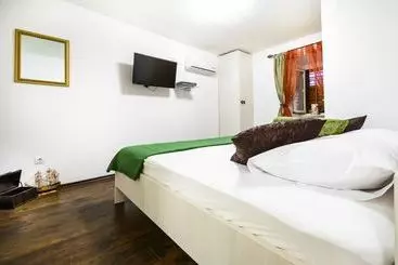 Отель Apartments Plaza