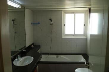 پانسیون Room In Guest Room   Datacom House   The Sky Blue Room