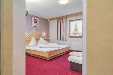 تختخواب و صبحانه Garni Vierjahreszeiten