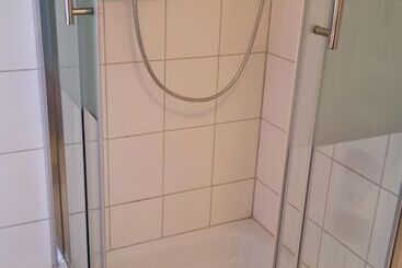 Отель Merlin Garni