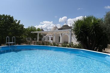 Жильё для туристов Trulli Munno Con Piscina By Wonderful Italy