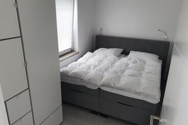 ツーリストアパートメント Fewo Am Achterwasser