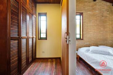 Apartamentos turísticos Casa Com Piscina Em Frente à Praia Grande