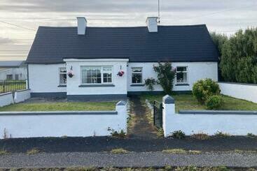 Apartamente turistice Maisie S Seaside Cottage