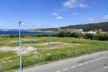 آپارتمانهای توریستها Piso En Primera Linea De Playa En Laxe