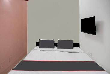 Hotel Capital O Uk House Residency