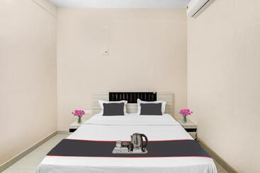 Hotell Capital O Sri Krishna Palace Near Sum Hospital