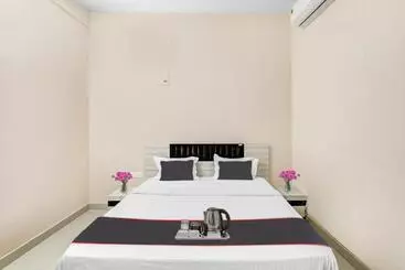 Hotel Capital O Sri Krishna Palace Near Sum Hospital