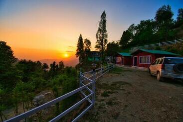 Hospedaria The Sunbird Cottage