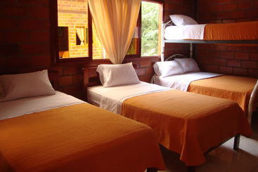 Отель Hostería Las Heliconias