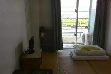 ペンション Minshuku Kumejima Bekkan