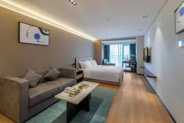 Hôtel Huawen Four Season