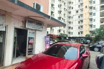 Hotel Lily S Room At Apartemen Cibubur Village By Fph