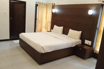 ホテル Nijaguna Residency