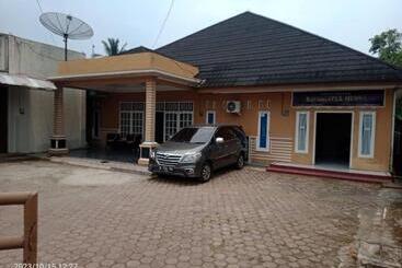 Hotel Oyo 93292 Raudhatul Husna Homestay Syariah