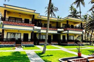 Hotelli Maadathil Beach Resort
