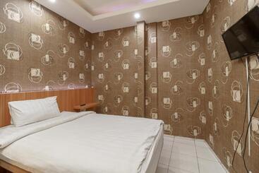 Hotel Green Apple Residence Near Sarinah Mitra Reddoorz