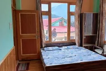 Pension Tatvamasi Living