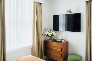 ホテル Rusk House Serviced Apartments