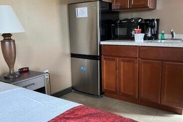 Отель Brinton Suites