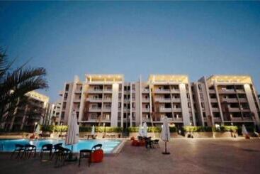 Resort شالية مكيف للعائلات بقرية جراند هيلز الساحل الشمالي الاتصال قبل الحجز