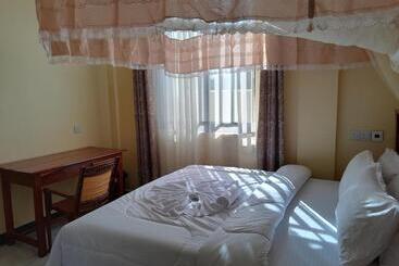 ホテル Gustina Zuzu Village Lodge