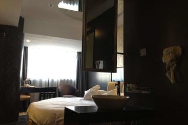 Qingmu Hotel Taizhou Pozi Road Binhe Plaza
