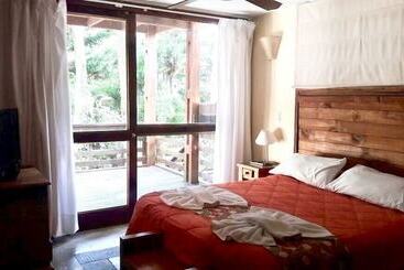 Apartmanszálloda Altos Medanos Cabañas & Club De Bosque