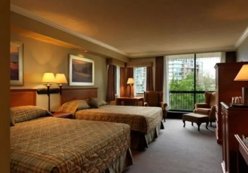 Отель The Q Apartments