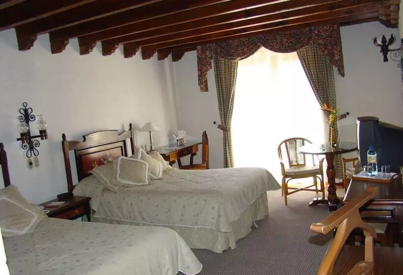 Отель Mansion Del Cupatitzio