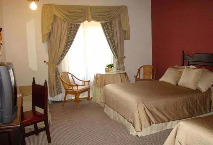 Отель Mansion Del Cupatitzio